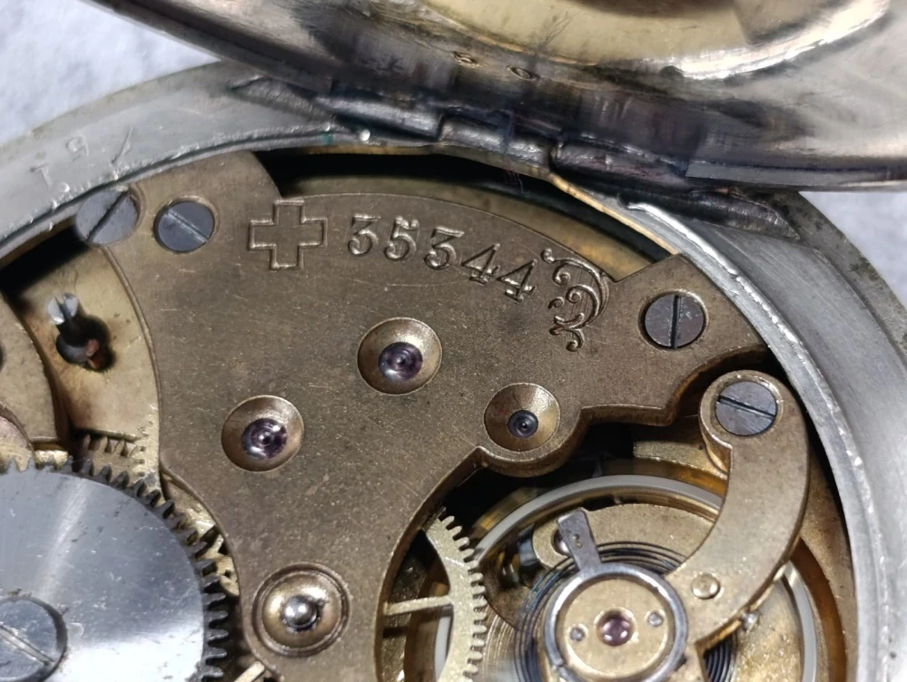Starožitné švýcarské kapesní hodinky DOXA - erotický motiv
